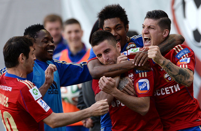 Tosic with teammates following his championship strike.